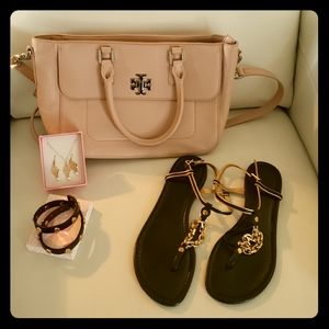 Tory burch . It's sweet clean perfect!   Final price